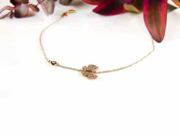 armband in roos goud met vlinder en diamant