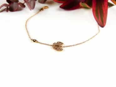 armband in roos goud met vlinder en diamant