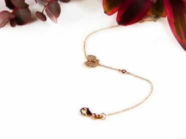 armband in roos goud met vlinder en diamant