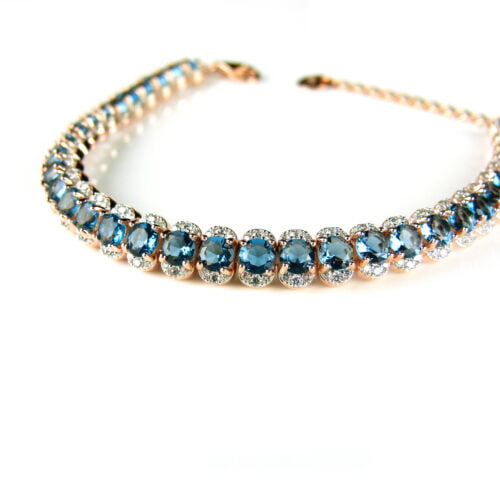 Armband tennis in zilver roos goud verguld gezet met blauwe stenen en cubic zirconia