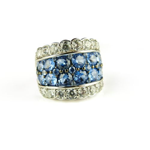 Zilveren ring gezet met blauwe stenen en cubic zirconia