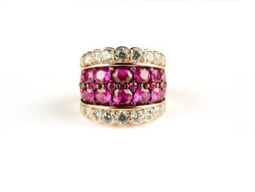 Zilveren ring roze goud verguld gezet met roze rode stenen en cubic zirconia