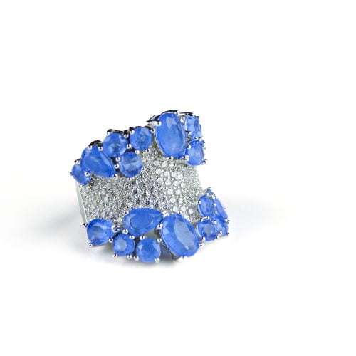 Brede zilveren ring blauwe stenen en cubic zirconia