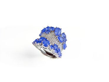 Brede zilveren ring blauwe stenen en cubic zirconia