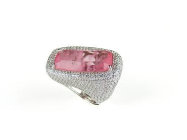 Brede zilveren ring met roze stenen en cubic zirconia