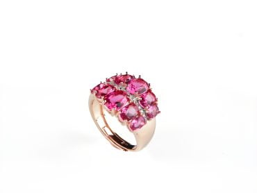Brede zilveren ring roze goud verguld gezet met roze rode stenen en cubic zirconia