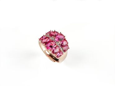 Brede zilveren ring roze goud verguld gezet met roze rode stenen en cubic zirconia