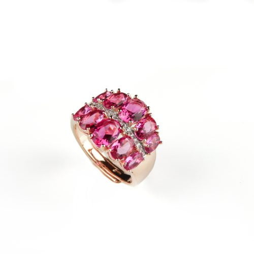 Brede zilveren ring roze goud verguld gezet met roze rode stenen en cubic zirconia