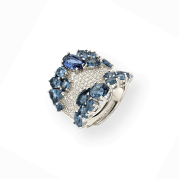 Brede zilveren ring blauwe stenen en cubic zirconia