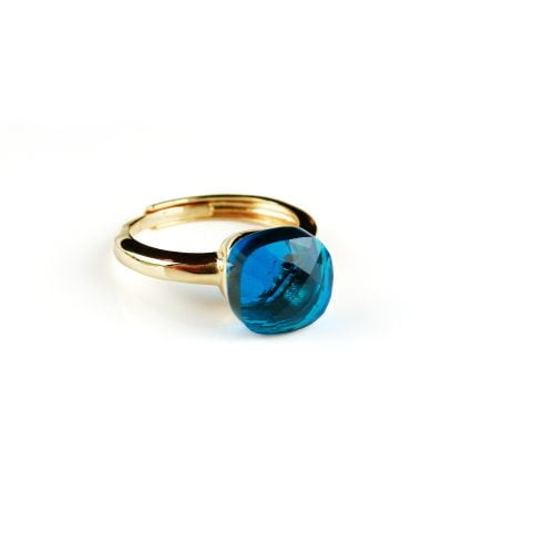 Ring in zilver geelgoud verguld model pomellato turkoois blauwe steen