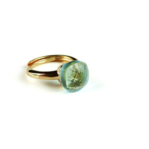 Ring in zilver geelgoud verguld model pomellato licht blauwe steen