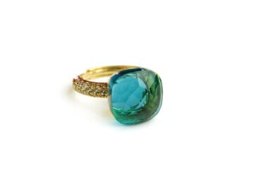 Ring in zilver geelgoud verguld model Pomellato met blauwe steen en cubic zirconia