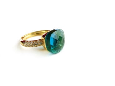 Ring in zilver geelgoud verguld model Pomellato met blauwe steen en cubic zirconia