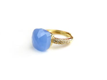 Ring in zilver geelgoud verguld model Pomellato met licht blauwe steen en cubic zirconia