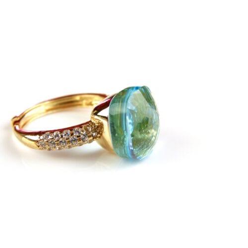 Ring in zilver geelgoud verguld model Pomellato met licht blauwe steen en cubic zirconia