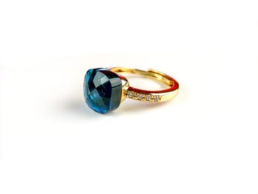 Ring in zilver geelgoud verguld model Pomellato met blauwe steen en cubic zirconia