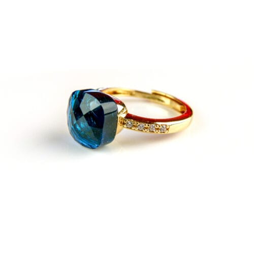 Ring in zilver geelgoud verguld model Pomellato met blauwe steen en cubic zirconia