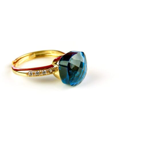 Ring in zilver geelgoud verguld model Pomellato met blauwe steen en cubic zirconia